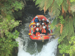 Leading Edge team about to raft down a waterfall