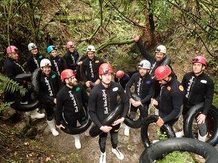 Leading edge team with swim rings and helmets